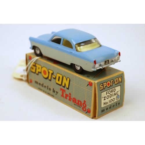 619 - SPOT-ON by Tri-ang. No.100 Ford Zodiac finished in light blue with grey sides, ivory interior. Comes... 