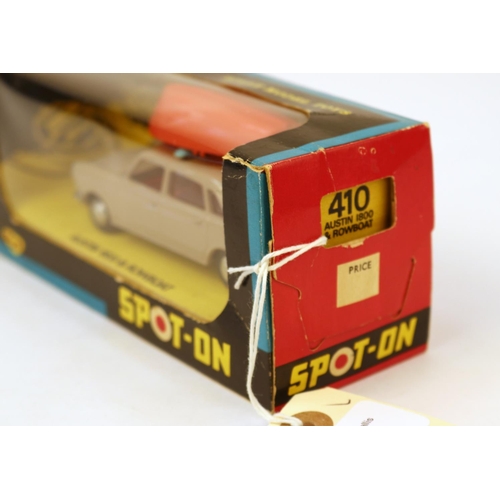 621 - SPOT-ON by Tri-ang No.410 Austin 1800 and Rowboat. In mushroom with red interior. With an orange pla... 