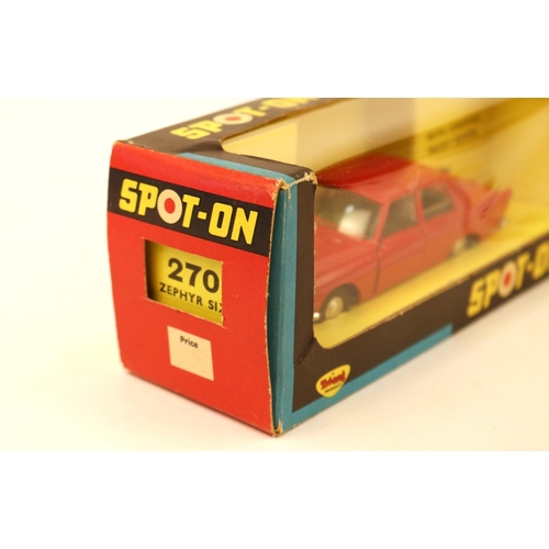 627 - SPOT-ON by Tri-ang No.270 Ford Zephyr Six. In bright red with grey interior, with Lady driver and po... 