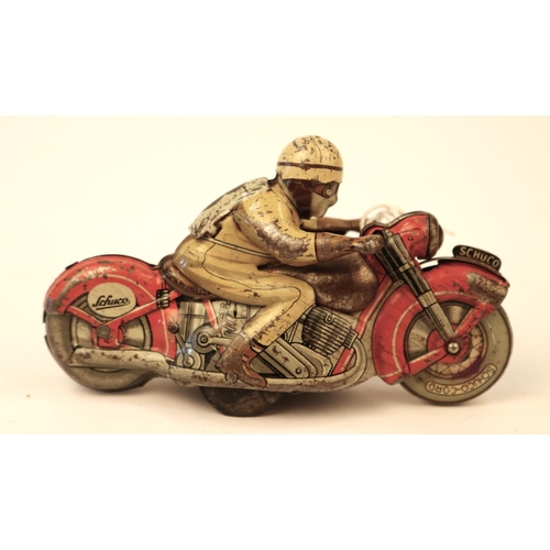 631 - 2 tinplate Schuco clockwork powered Racing Motorcycles. Length 13cm, racing numbers 3 & 5. In red wi... 