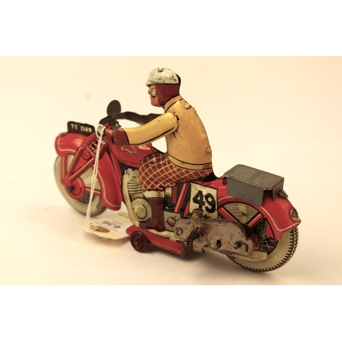 636 - A rare Mettoy tinplate clockwork racing motorcycle TT3149. Bike in red, RN49, Litho detail, rider wi... 