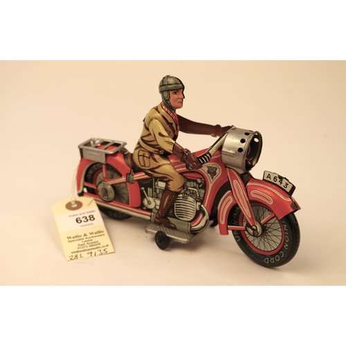 638 - A rare Arnold A643 tinplate clockwork touring motorcycle. In red and white with litho detailing, rid... 