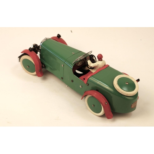 648 - A rare 1930's No.2 Meccano Constructor Car. A round tail example in green with red mudguards, red se... 