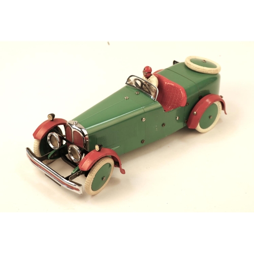 648 - A rare 1930's No.2 Meccano Constructor Car. A round tail example in green with red mudguards, red se... 