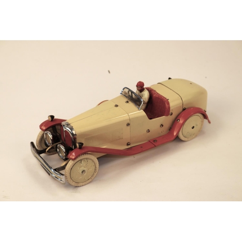 649 - A rare 1930's No.2 Meccano Constructor Car. A round tail example in cream with red mudguards and run... 