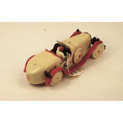 649 - A rare 1930's No.2 Meccano Constructor Car. A round tail example in cream with red mudguards and run... 