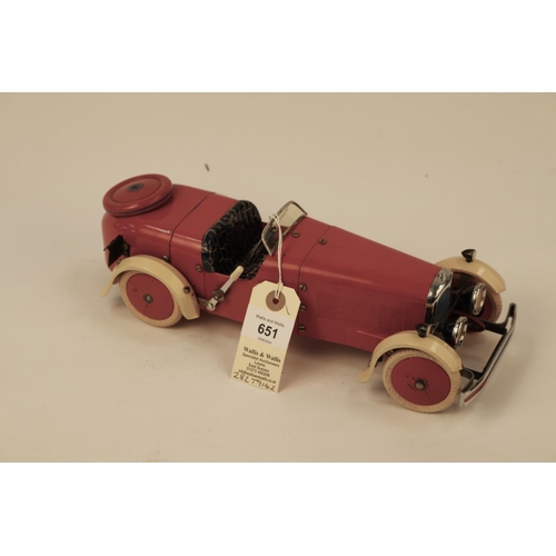 651 - A rare 1930's No.2 Meccano Constructor Car. A round tail example in red with cream mudguards, dark b... 