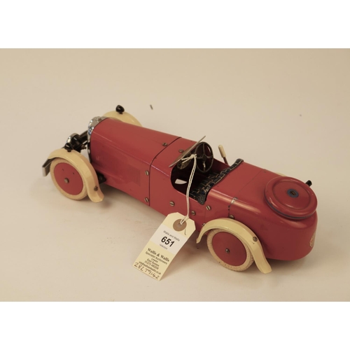 651 - A rare 1930's No.2 Meccano Constructor Car. A round tail example in red with cream mudguards, dark b... 