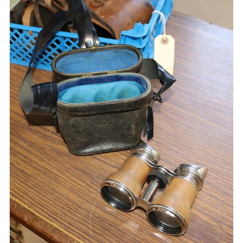 366 - 2 pairs of vintage binoculars, one is of military issue and comes with its original leather case, li... 