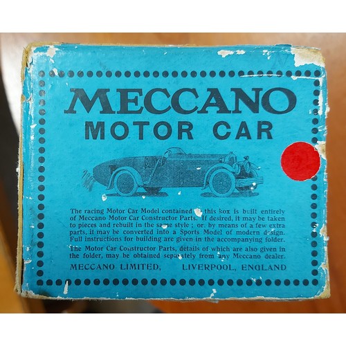 651 - A rare 1930's No.2 Meccano Constructor Car. A round tail example in red with cream mudguards, dark b... 