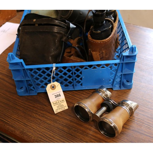 26 - 2 pairs of vintage binoculars, one is of military issue and comes with its original leather case, li... 