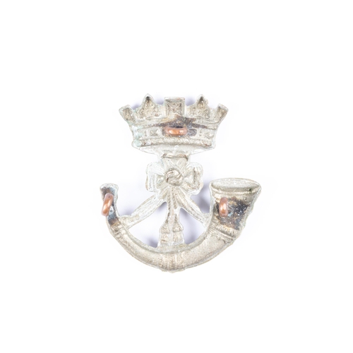 259 - A white metal cap badge of the 2nd Volunteer Battalion the Duke of Cornwall's Light Infantry, 1895-1... 