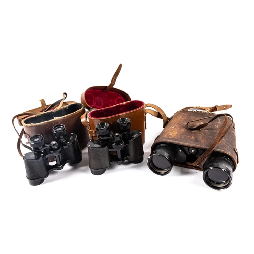 27 - A pair of Aquilus 8x30 binoculars in their case; and a pair of Lemoire Orientis 8x34 binoculars in t... 