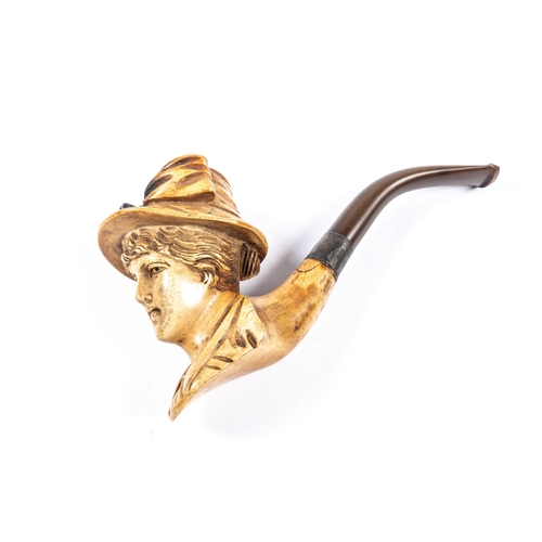 30 - A meerschaum pipe, the bowl in the form of a young woman's head, wearing a hat. GC (shows signs of m... 