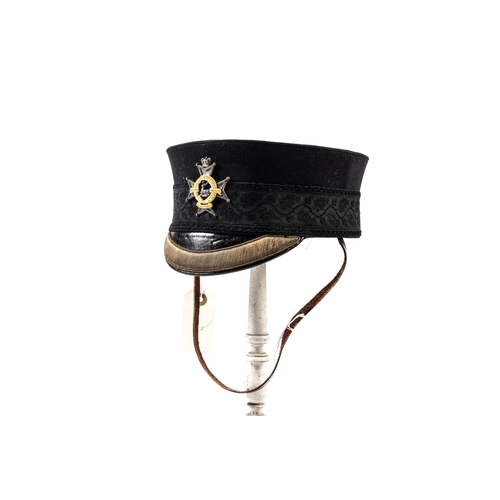 315 - A good Victorian Officer's peaked drill cap of the Sherwood Foresters Derbyshire Regiment, with fine... 