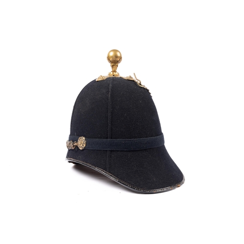 331 - A post 1902 ORs blue home service helmet of the Royal Artillery (Territorial Force), brass mounts, G... 