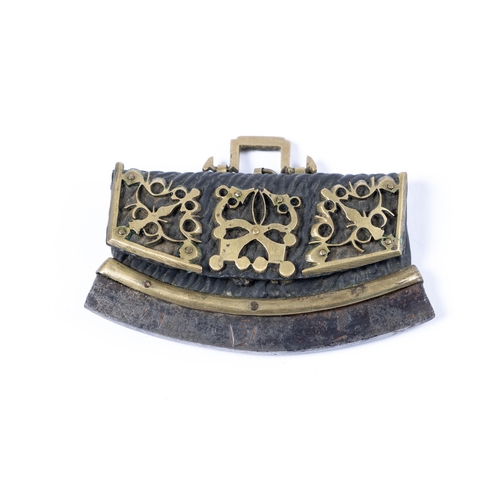 34 - A small 18th century Tibetan chuk muk, of ribbed leather with openwork brass mounts and brass suspen... 