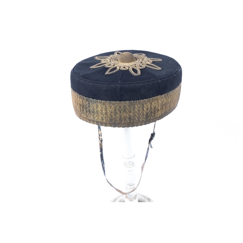 343 - A Victorian officer's pill box hat of the Royal Artillery, blue with gilt lace. £100-120