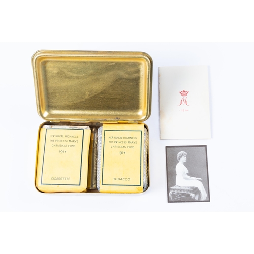 38 - A good Christmas 1914 Princess Mary gift tin, containing unopened packets of cigarettes and tobacco,... 