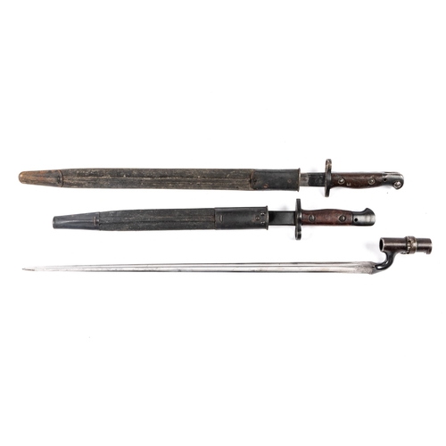 419 - A P1876 Martini triangular socket bayonet, the blade with Indian markings; a 1907 SMLE by Sanderson,... 