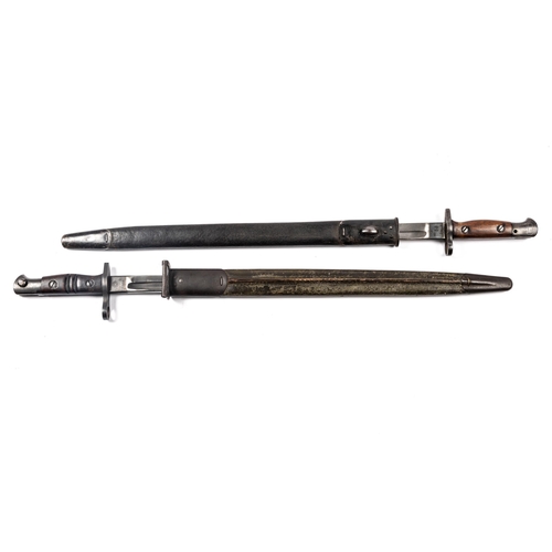 421 - A 1907 pattern S.M.L.E. bayonet, issue date April 1915, in its scabbard; a P14 bayonet, dated August... 