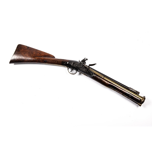 438 - A brass barrelled flintlock blunderbuss with spring bayonet, by Jennings of Hereford, c 1800, 29½