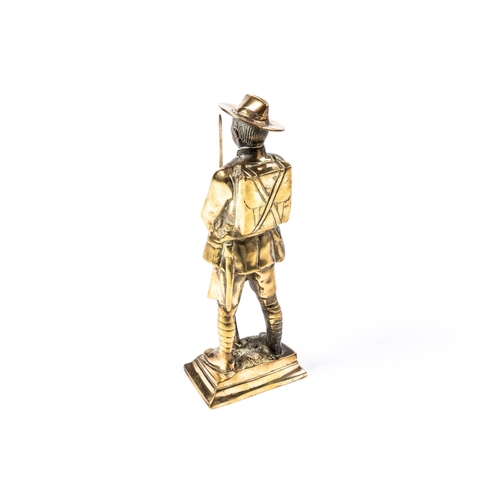 45 - A brass figure of a Gurkha soldier standing 