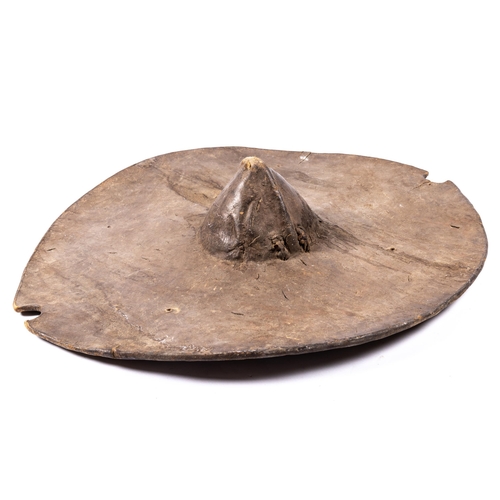 458 - A scarce Dervish (Hadendoa) tribesman's circular rhino hide shield. Diameter 22½