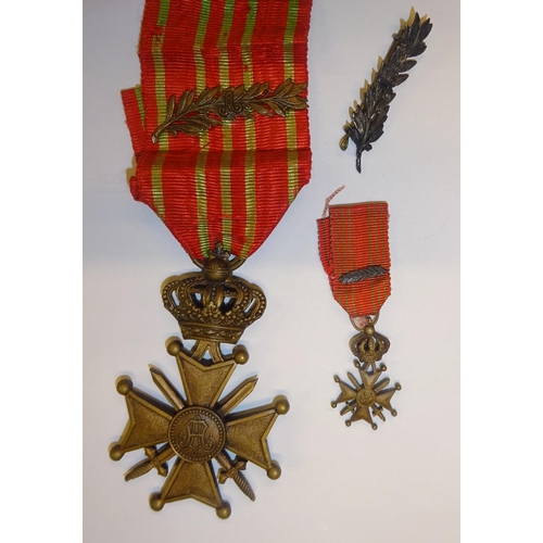 76 - Belgium: Croix de Guerre, with palm leaf; a miniature of the above; a separate palm leaf for the abo... 