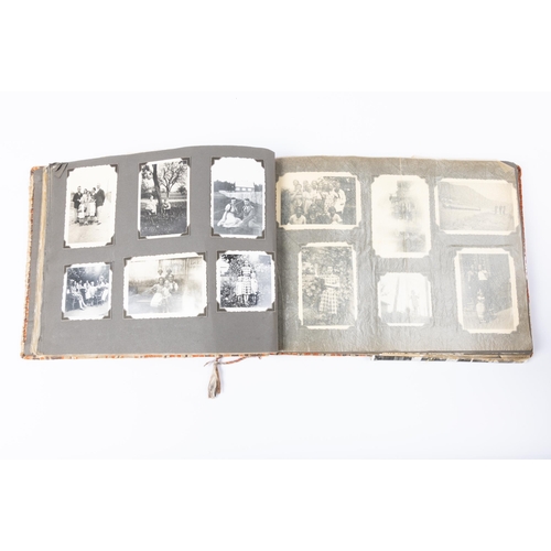 92 - A Third Reich photograph album dated 1938, containing photographs of the BDM (Bund Deutscher Madel, ... 