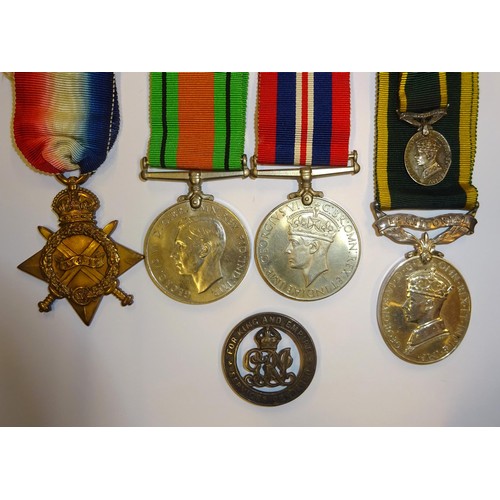 60 - A family group of four: 1914-15 star (10176 L. Sjt (A. Sjt) E Myson G Gds) VF;   and Three: Defence ... 