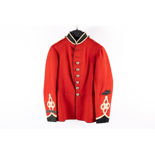 372 - A very scarce Victorian OR's scarlet tunic of the Brighton Volunteer Rifles, blue facings with white... 