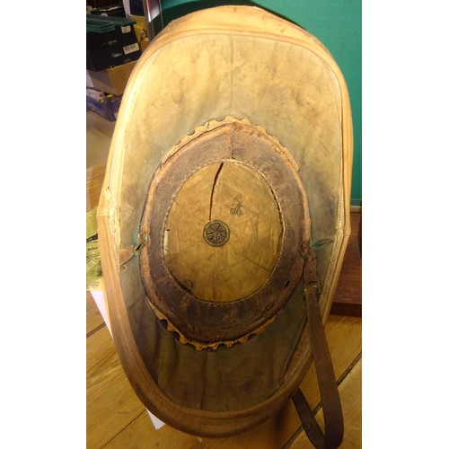 345 - A scarce Victorian Boer War type foreign service helmet, complete with khaki cover bearing patch of ... 