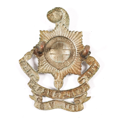 168 - A white metal cap badge of the 1st Volunteer Battalion the Royal Sussex Regiment. GC £50-60