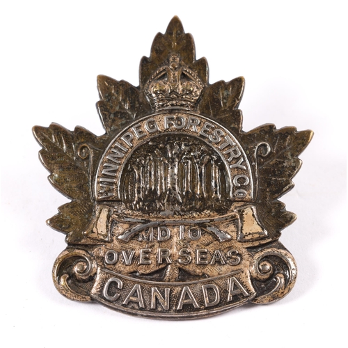 174 - A WWI C.E.F.  cap badge of the Winnipeg Forestry Company (Military District 10), with silver wash on... 