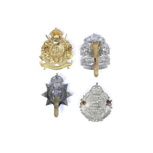 202 - 4 Colonial cap badges: Gold Coast Rifle Volunteers, 1902-19; Southern Nigeria Volunteers (slider rep... 