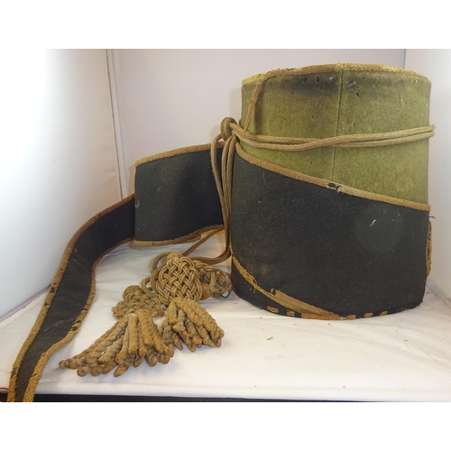 250 - An extremely rare Georgian Cavalry Mirliton cap, green body with black wrap around, worsted edge tri... 