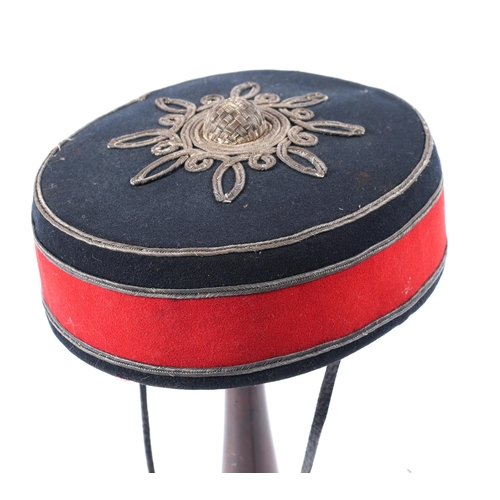 279 - A Victorian Yeomanry officer's pill box, blue body, scarlet band, silvered lace. GC £100-120