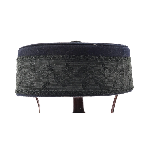 281 - A good late Victorian officer's pillbox hat to a Rifle Regiment, stiffened type, lining marked 