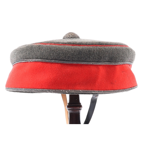 283 - A good Victorian Rifle Volunteer officer's soft pillbox hat, grey cloth with silvered lace and red p... 