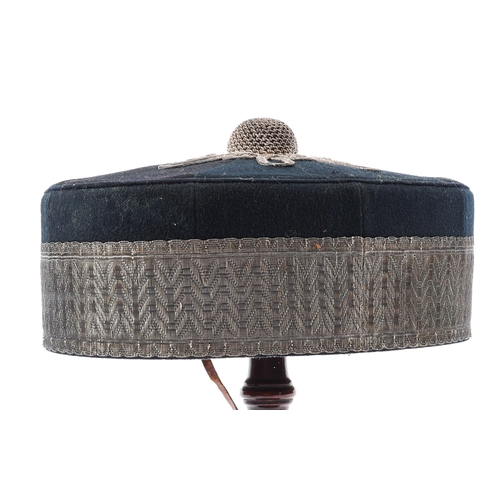 287 - A Victorian officer's pill box hat to the Artillery Volunteers, scalloped sweat band, lining bearing... 