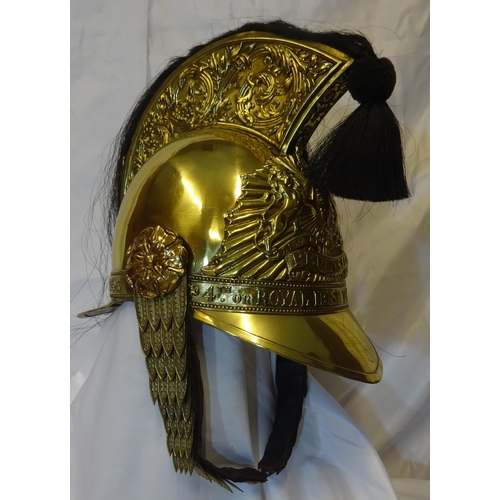 297 - A fine and rare OR's brass helmet of the 4th Royal Irish Dragoon Guards, foliate embossed crest with... 