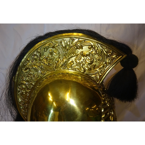 297 - A fine and rare OR's brass helmet of the 4th Royal Irish Dragoon Guards, foliate embossed crest with... 