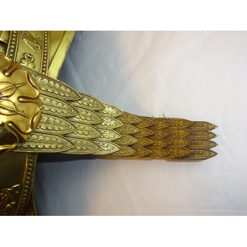 297 - A fine and rare OR's brass helmet of the 4th Royal Irish Dragoon Guards, foliate embossed crest with... 