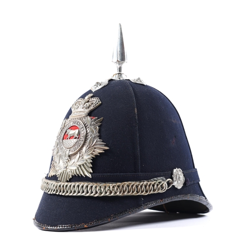 303 - A Victorian OR's blue home service helmet of the 2nd Oxfordshire Volunteer Rifle Corps, WM mounts. G... 