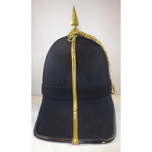 311 - A post 1902 home service officer's helmet of the Army Ordnance Corps, blue cloth with gilt mounts, s... 