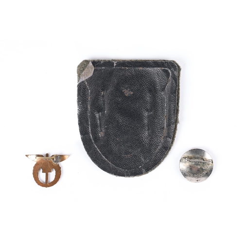 97 - A Third Reich Kuban shield on field grey patch, A Deutsche Jungvolks enamelled badge and a miniature... 