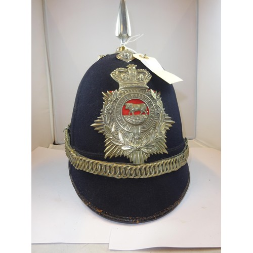 303 - A Victorian OR's blue home service helmet of the 2nd Oxfordshire Volunteer Rifle Corps, WM mounts. G... 