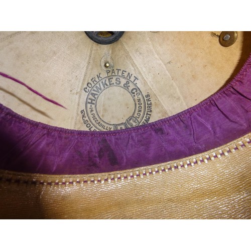 305 - A late Victorian Officer's blue home service helmet of the Royal Artillery, brass mounts with traces... 