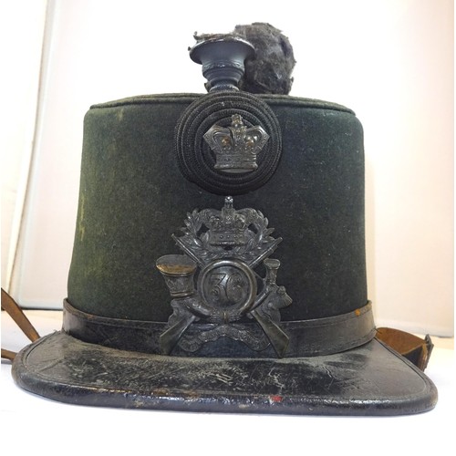 260 - An officer's shako of the 2nd Battalion, the Monmouthshire Regiment, c 1865, with blackened badge an... 